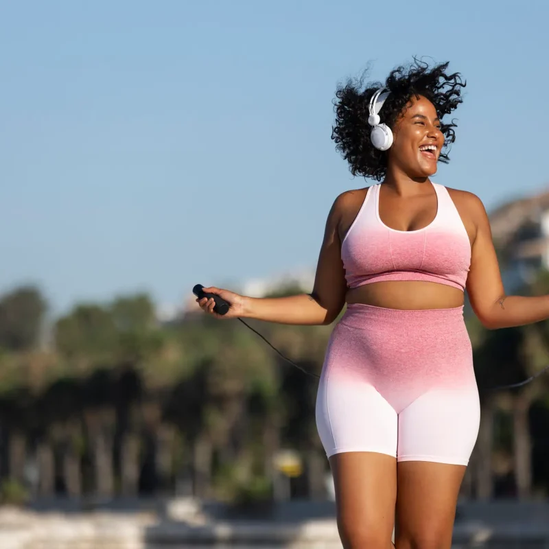 front-view-woman-jumping-rope-outdoors